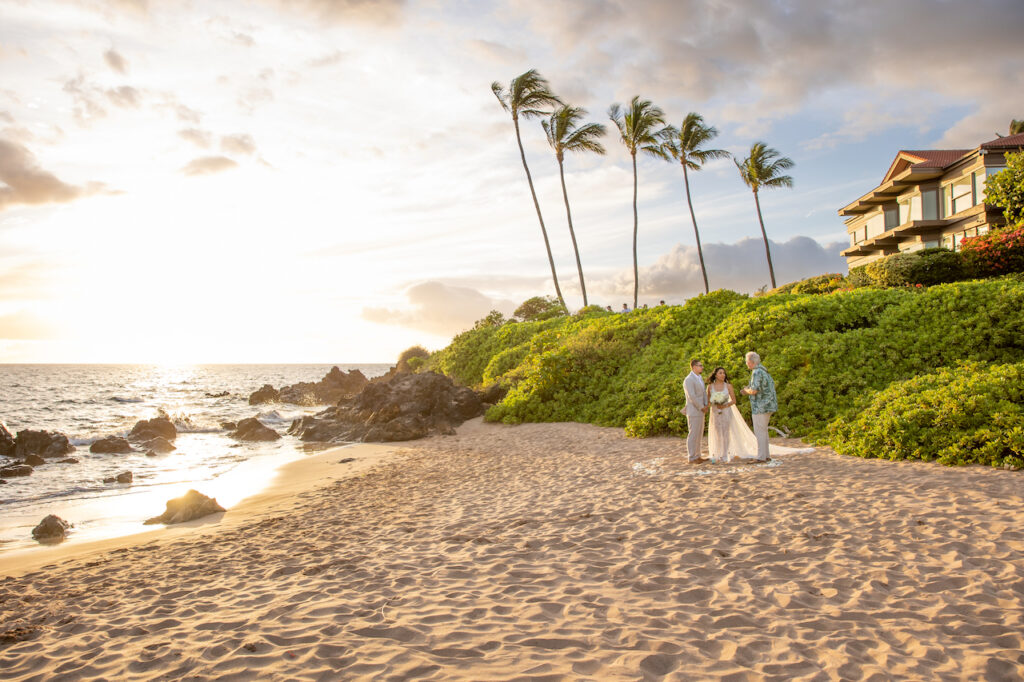 An intimate Maui, Hawai'i sunset elopement tucked away at a small Wailea cove under the palms; it does not get any better than this! 