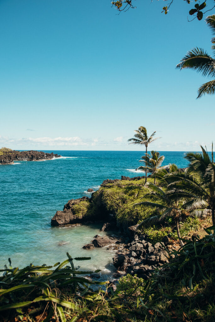 Maui Elopement Photographer captures epic views of ocean in private cove in Maui before Hawaii beach wedding