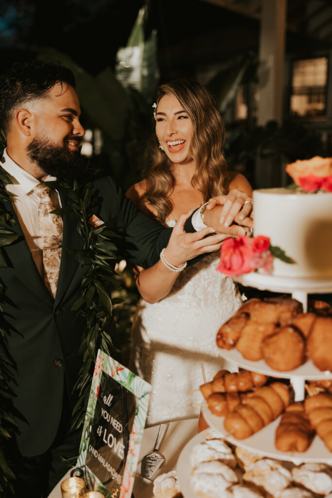 Maui Elopement Photographer captures bride laughing and celebrating with groom