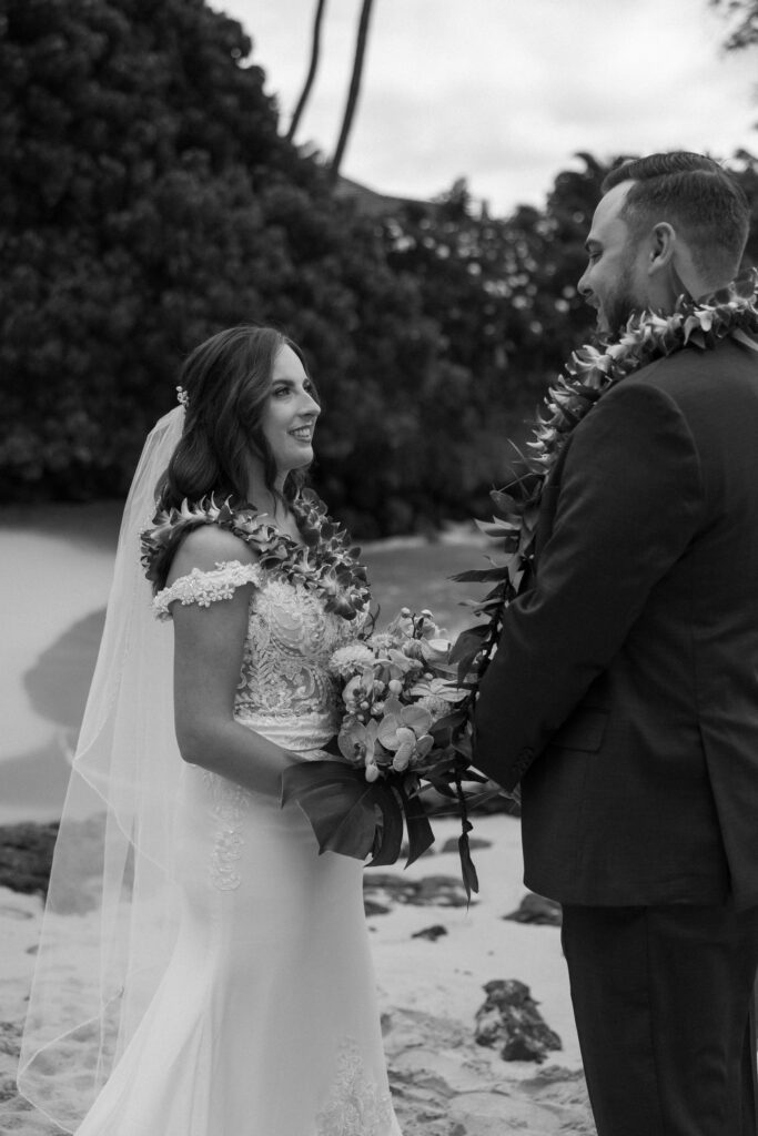 Maui Elopement Photographer captures groom holding bride's hand