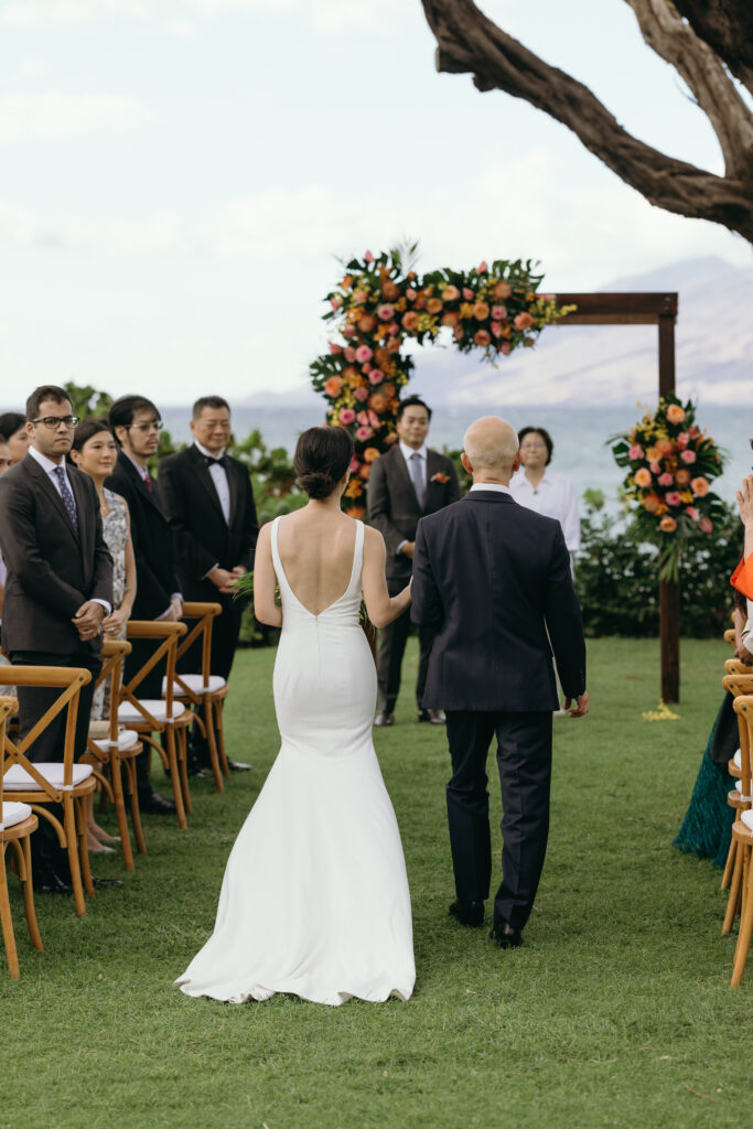 Maui Elopement Photographer captures bride being walked down aisle by father 