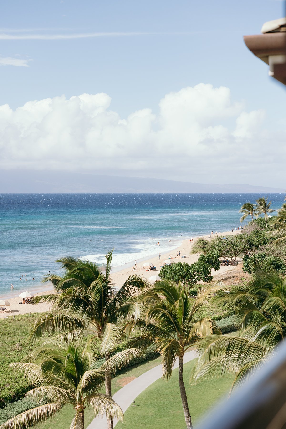 Panoramic view of a golden Maui shoreline and turquoise water, the perfect backdrop for couples planning to elope in Maui.